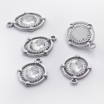 Zawieszka ze stali chirurgicznej owal z białym kryształem górskim 21,5mm