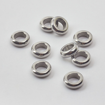 Przekładka oponka do męskich bransoletek ze stali chirurgicznej w kolorze srebrnym 9x3mm