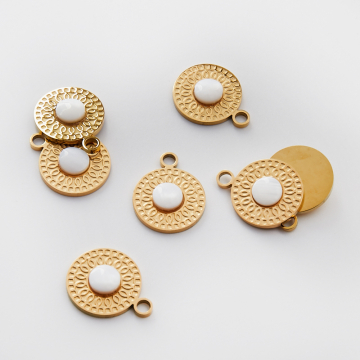 Zawieszka ze stali chirurgicznej kółko z masą perłową w kolorze złotym 19mm PVD