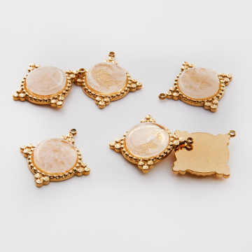 Zawieszka ze stali chirurgicznej kółko z kryształem górskim w kolorze złotym 25mm PVD