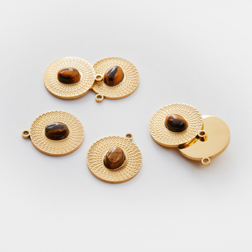 Zawieszka ze stali chirurgicznej kółko nacinane z tygrysim okiem w kolorze złotym 21mm PVD