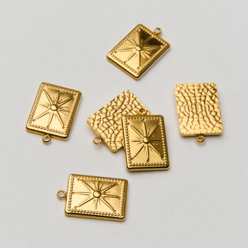 Zawieszka ze stali chirurgicznej gwiazda północy w kolorze złotym 18,5mm PVD