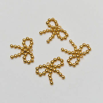 Zawieszka ze stali chirurgicznej kokardka z kulek w kolorze złotym 19,5mm PVD