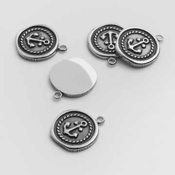 Zawieszka ze stali chirurgicznej kółko nieregularne z kotwicą w kolorze srebrnym 17,5mm