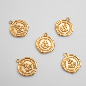 Zawieszka ze stali chirurgicznej kółko nieregularne z kotwicą w kolorze złotym 17,5mm PVD