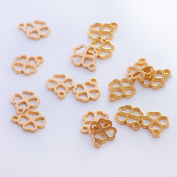 Zawieszka ze stali chirurgicznej koniczynka w kolorze złotym 11,5mm PVD