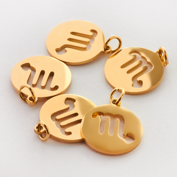 Zawieszka ze stali chirurgicznej znak zodiaku Skorpion w kolorze złotym 15mm