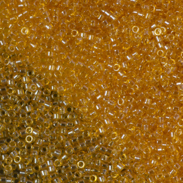 Koraliki TOHO Treasure Trans-Lustered Lt Topaz