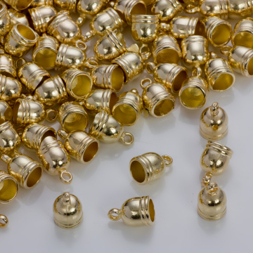 Końcówki do rzemieni i sznurków beczułki w złotym kolorze 8,5mm