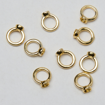 Końcówki okrągłe do nici, linek, sznureczków mosiądz pozłacany 14k Au585 0,7mm