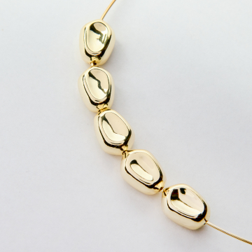 Przekładka fasolka z mosiądzu w kolorze złotym 16x12mm