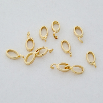 Krawatka owalna do naszyjników z mosiądzu w kolorze złotym 8x3,5mm