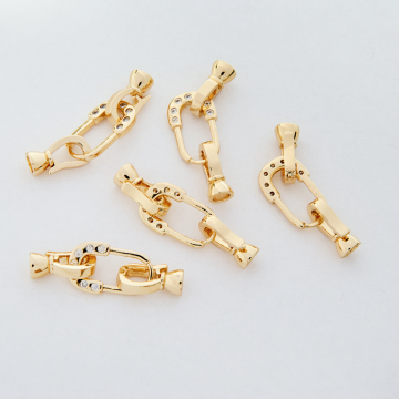 Zapięcie ozdobne z cyrkoniami z mosiądzu w kolorze złotym 36,5x11mm