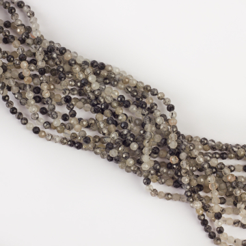 Kryształ górski z czarnym rutylem kulka fasetowana 4mm - na sznurze