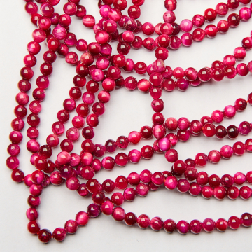 Różowe tygrysie oko kulka gładka 6,5mm