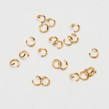 Kółeczka zaciskowe ze stali chirurgicznej w kolorze złotym 3x0,4mm