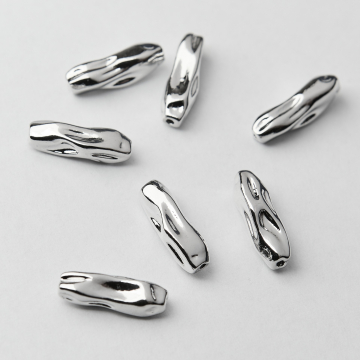 Przekładka oliwka długa gnieciona z mosiądzu w kolorze srebrnym 17x5,5mm