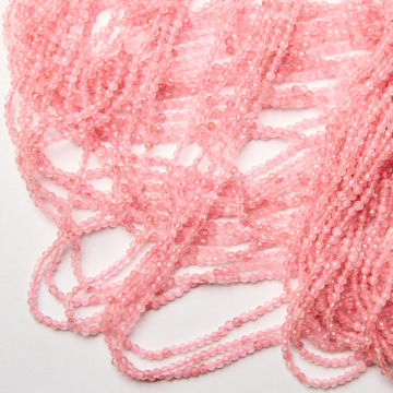 Kryształ górski truskawkowy kulka fasetowana 2,5mm - na sznurze