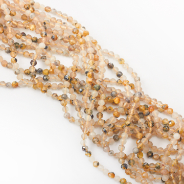 Kryształ górski ze złotym rutylem kulka fasetowana 5,5mm