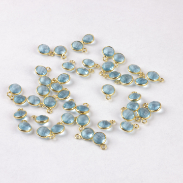 Topaz błękitny krążek fasetowany w okuciu zawieszka AG925 6mm