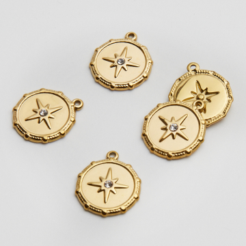 Zawieszka ze stali chirurgicznej kółko ozdobne z różą wiatrów i cyrkonią w kolorze złotym 18,5mm