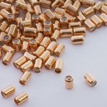 Zapięcie stoper z silikonem do cienkich sznureczków walec złoty 5x4mm