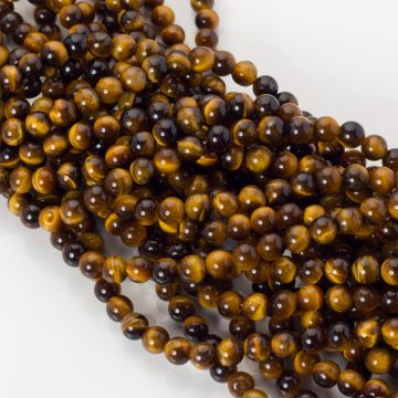 Tygrysie oko kulki gładkie 6,5mm Tygrysie oko kulki gładkie 6,5mm