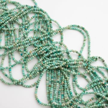 Turkus naturalny kulka fasetowana 2mm - na sznurze