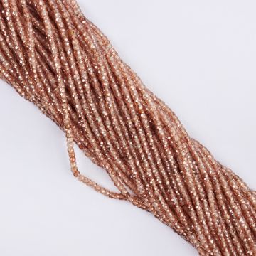 Cyrkonia oponka fasetowana 3x2mm beżowa - na sznury