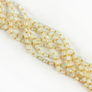 Opal syntetyczny baryłka fasetowana 6mm