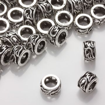 Koralik z ciemnego srebra ze skrzydełkami 13mm Koralik z ciemnego srebra ze skrzydełkami 13mm