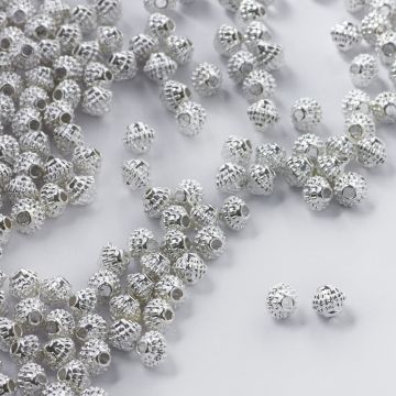 Metalowy koralik ufo w kropeczki 5,5mm