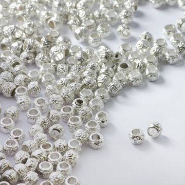 Koralik metalowy z zawijaskami 5mm