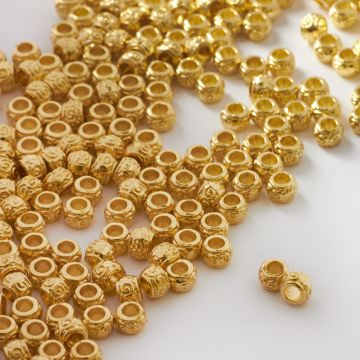 Koralik metalowy z zawijaskami 5mm