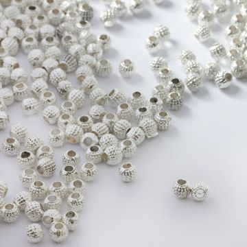 Koraliki metalowe kulki w kropeczki 4mm