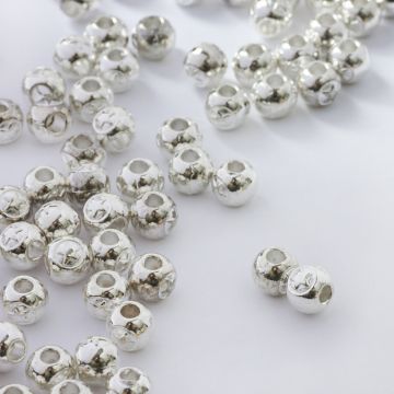 Koraliki metalowe kulki gładkie z gwiazdką 7mm