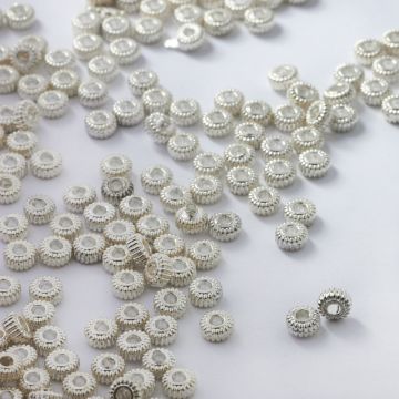 Koralik metalowy oponka rowkowana 4,5mm