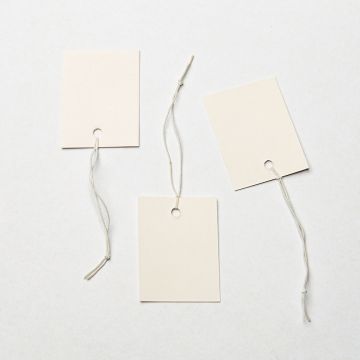 Metka z gumką do bizuterii biała 30x40mm