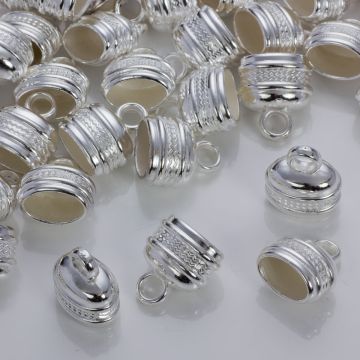 Podłużne końcówki z falkami do rzemieni w srebrnym kolorze 17x12mm