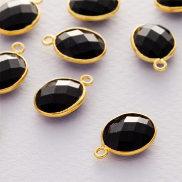 Onyks owal fasetowany zawieszka w okuciu pozłacanym AG925  14x10mm