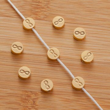 Srebrny koralik krążek nieskończoność AG925 pozłacany 6,5mm