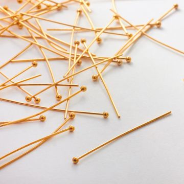 Szpilki ze stali chirurgicznej z okrągłą główką w kolorze złotym 40x0,7mm