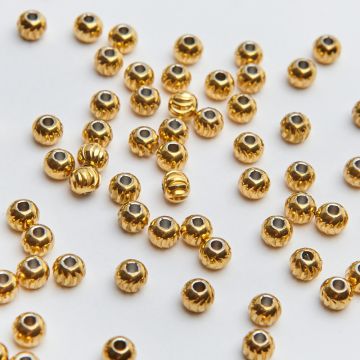 Przekładki kulki nacinane ze stali chirurgicznej w kolorze złotym 5mm