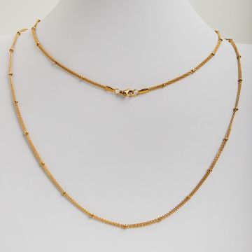 Łańcuszek ze stali chirurgicznej Bismarck z oponkami  w kolorze złotym 60cm