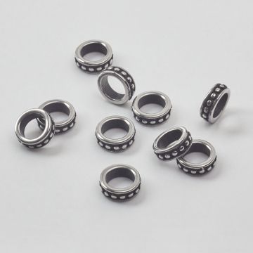 Przekładka oponka w kropeczki do męskich bransoletek ze stali chirurgicznej w kolorze srebrnym 9x3mm