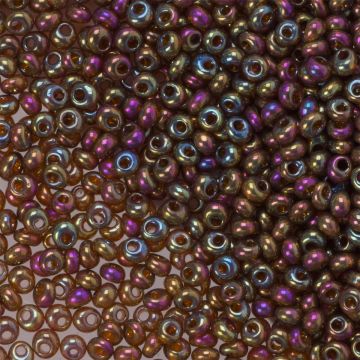 Koraliki TOHO Magatama 3mm Gold-Lustered Dark Topaz