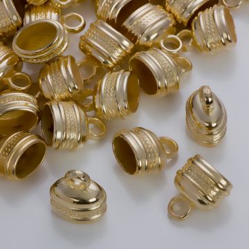 Podłużne końcówki z falkami do rzemieni w złotym kolorze 13x7,5mm