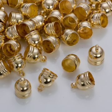 Końcówki do rzemieni i sznurków beczułki w złotym kolorze 9,5 mm