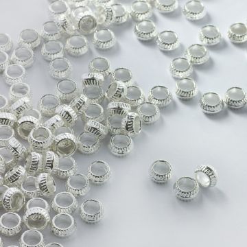 Metalowy koralik oponka z dużą dziurką 7mm