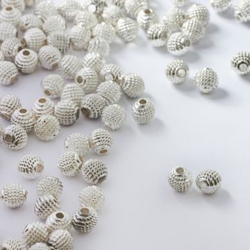 Koralik metalowy kulka w kropeczki 5,5mm